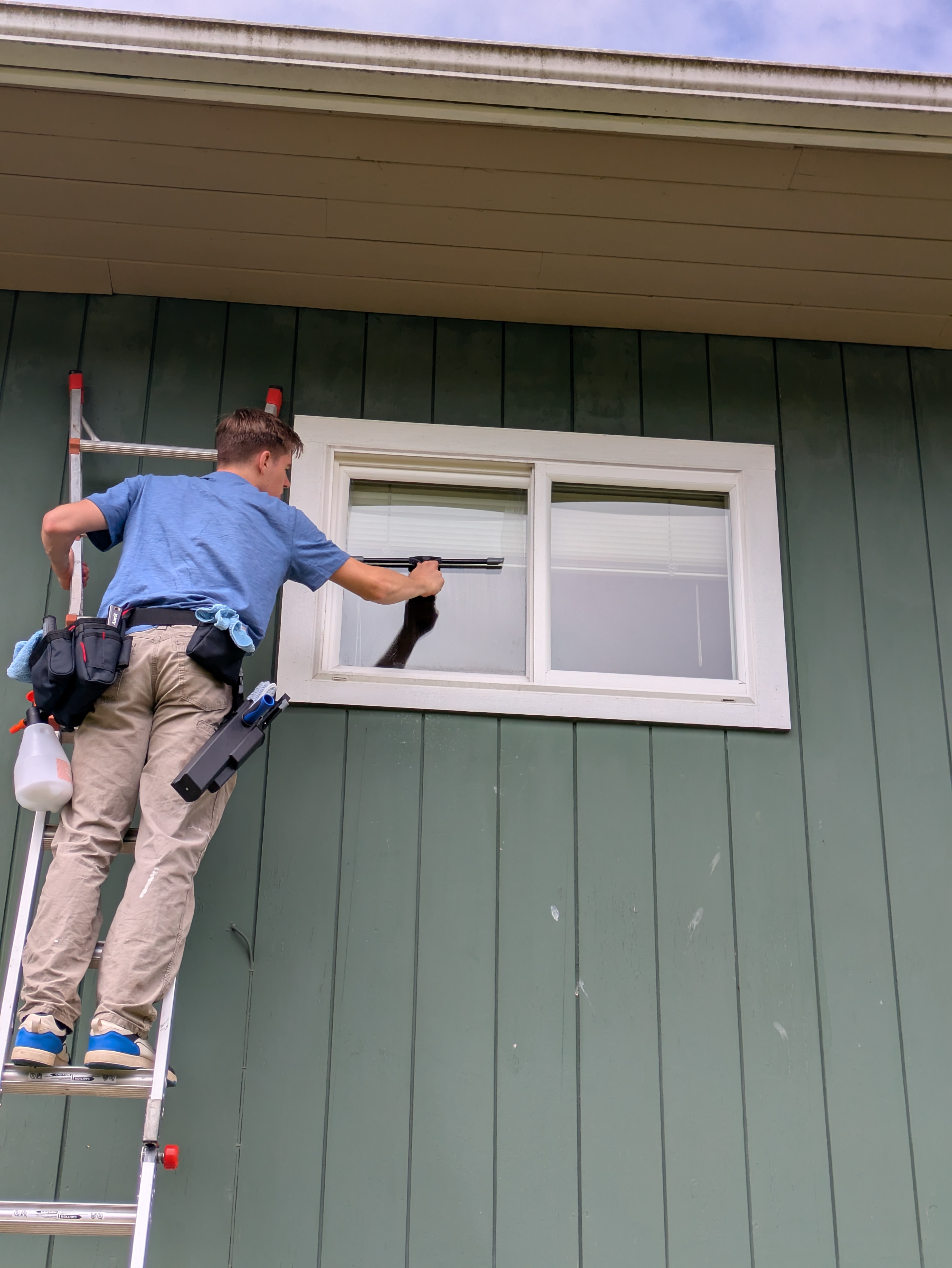 Window cleaner working